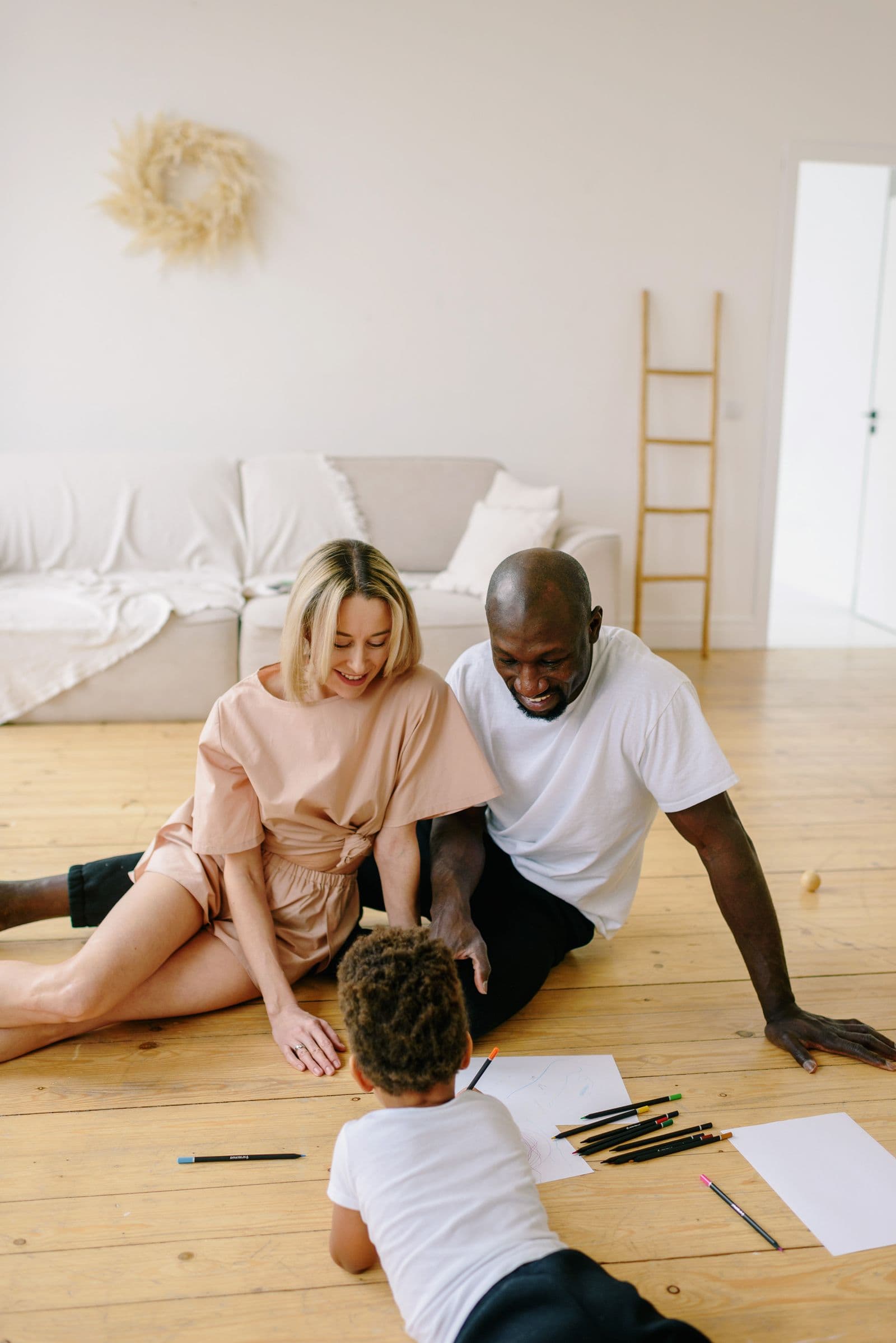 A parent and child learning together at home